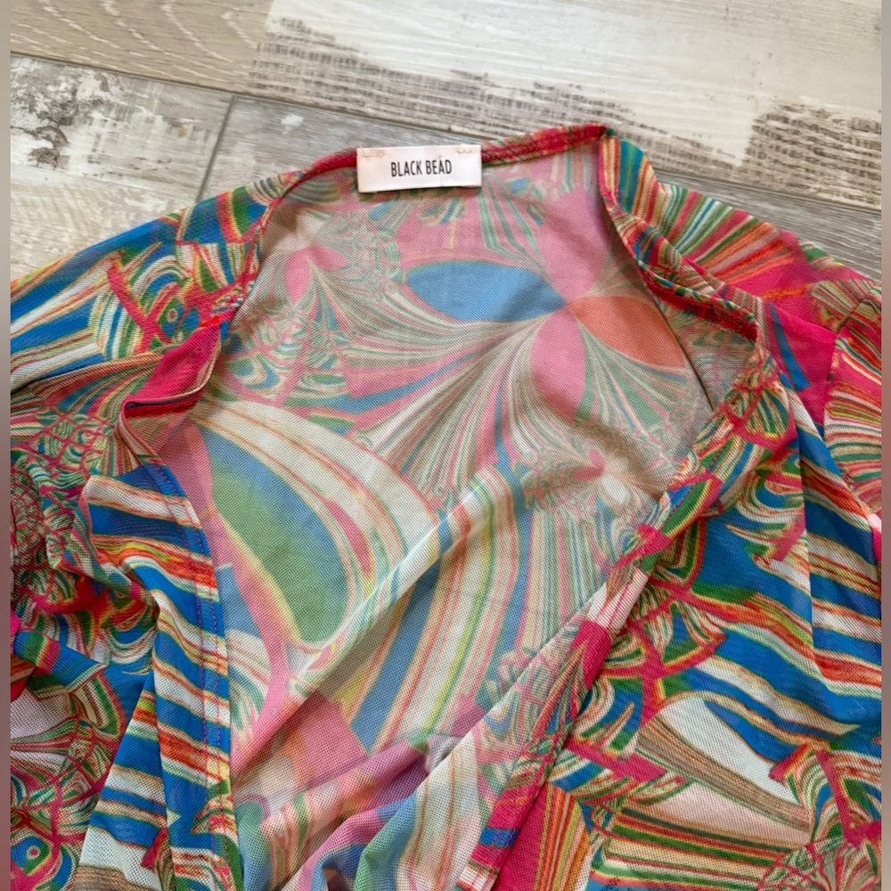 Rave tie top with very flowy sleeves
